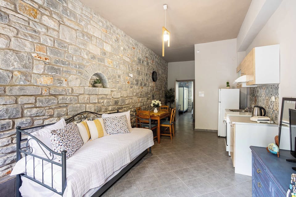 Comfortable lounge area surrounded by stone walls