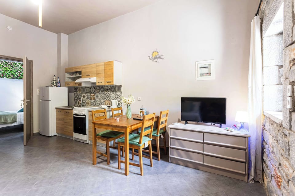 Open-plan layout combining dining, living, and kitchen spaces
