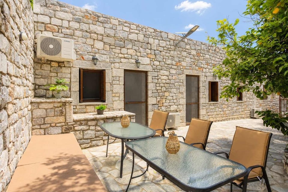 Warm and welcoming outdoor lounge area for sun-filled relaxation.