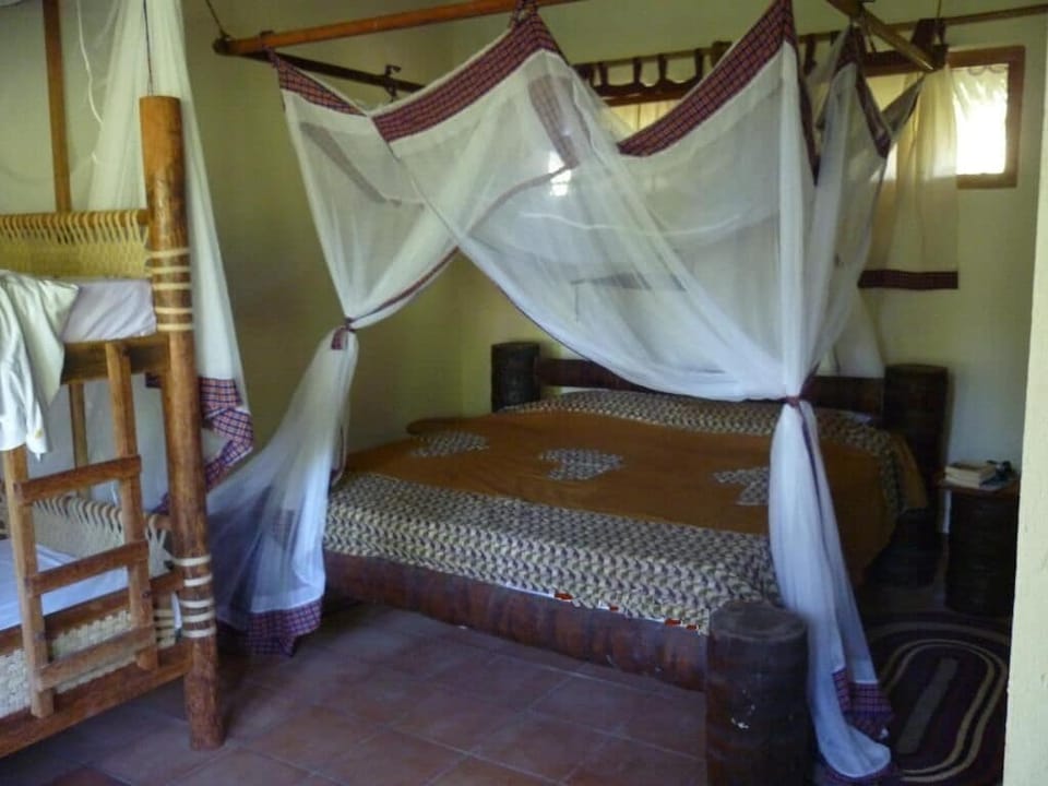 Deluxe Quadruple Room, Balcony, Ocean View | Hypo-allergenic bedding, in-room safe, desk, iron/ironing board