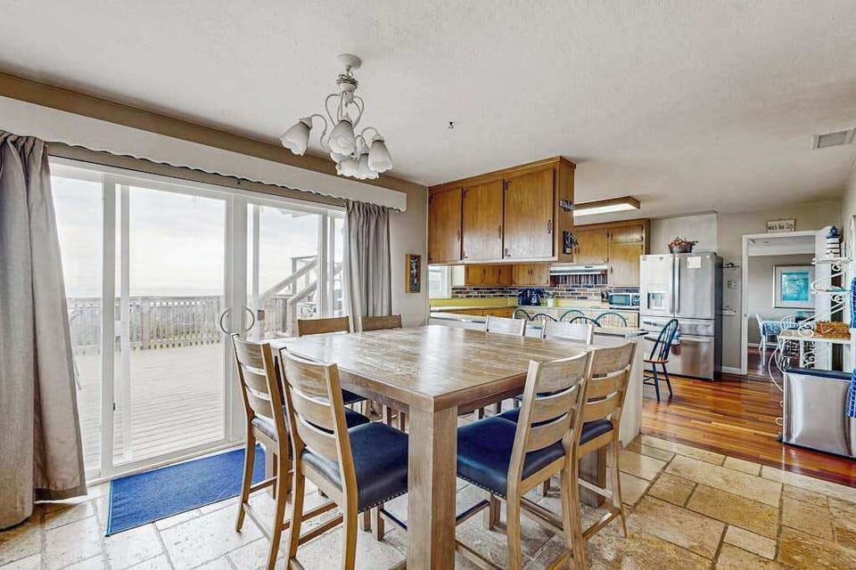 Step from your dining area straight through sliding glass doors onto the deck for sunset views over Bodega Bay.