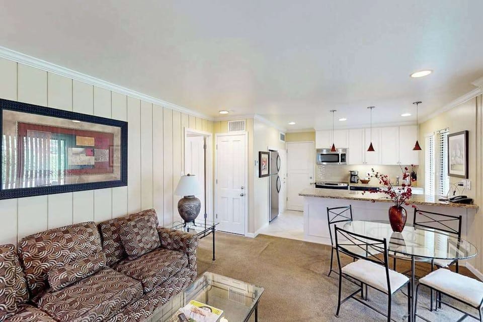 Gather around the dining table or lounge on the sofa in your bright, airy Napa Valley condo — designed for effortless wine country entertaining.