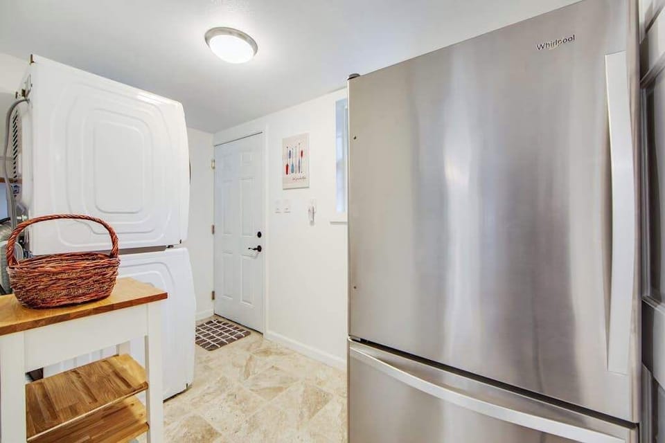 A full-size stainless steel refrigerator keeps your farmers market hauls and local wine perfectly chilled for your stay.