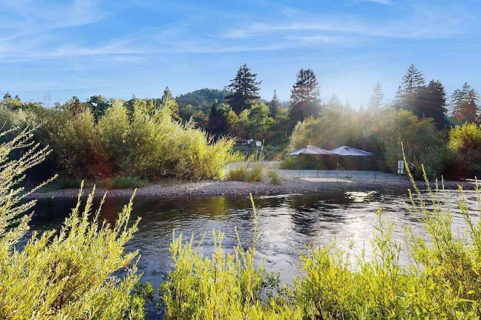 Morning mist rises over the Russian River just steps from your door — your private wine country waterfront in Healdsburg.