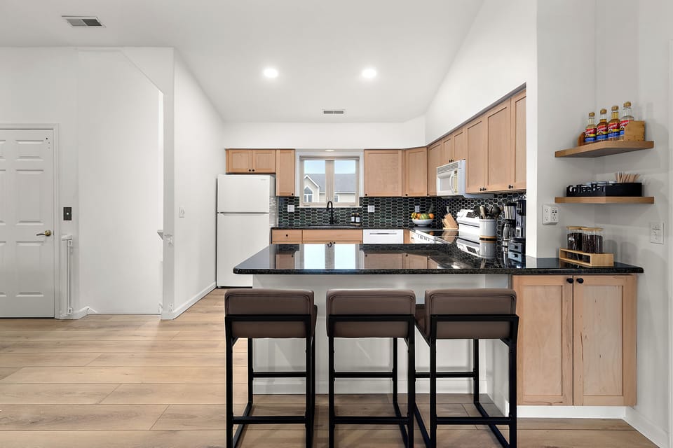 Granite counters, bar seating, and everything you need to cook like you're home