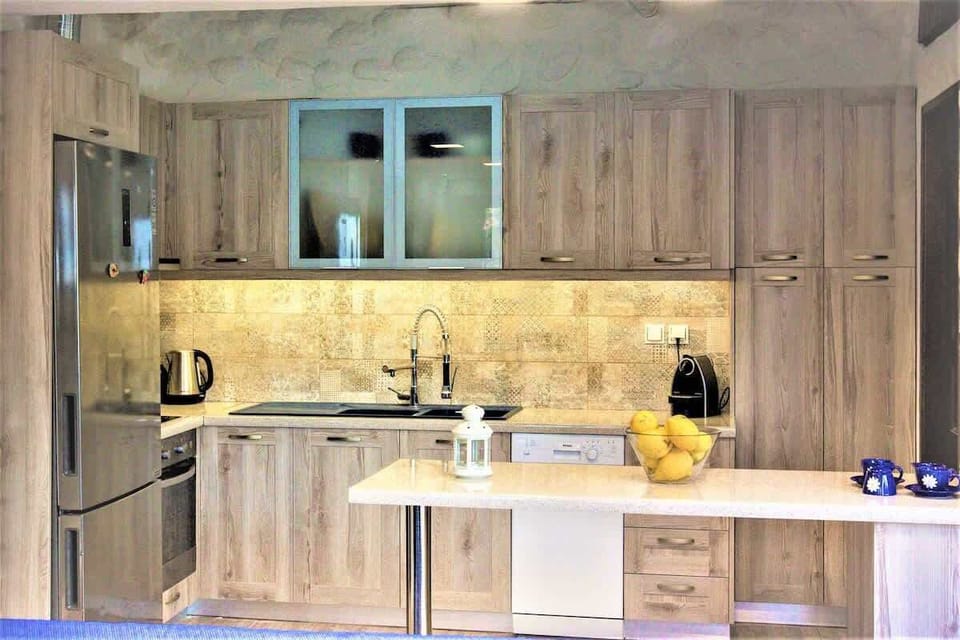 Fully equipped kitchen with all appliances and a large 700L fridge-freezer, ideal for longer stays. 