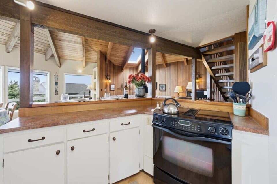 Kitchen | Pass-Through Counter | Living Area Views & Stair Access