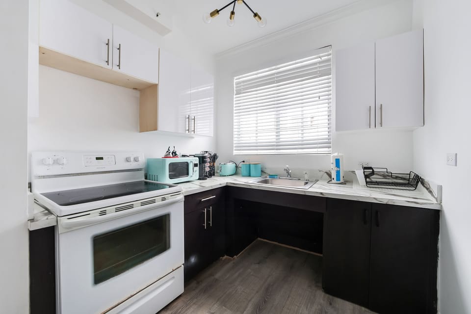 Family Apartment, 2 Bedrooms, 2 Bathrooms (Self check-in) | Private kitchen | Full-size fridge, microwave, coffee/tea maker, electric kettle