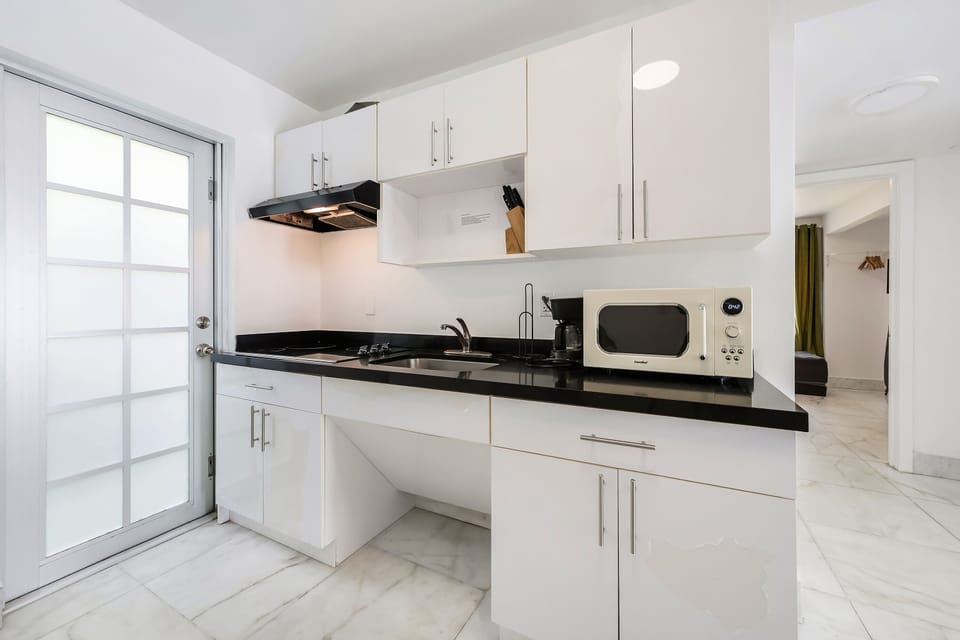 Family Apartment, 2 Bedrooms, Balcony (Self check-in) | Private kitchen | Full-size fridge, microwave, stovetop, cookware/dishes/utensils