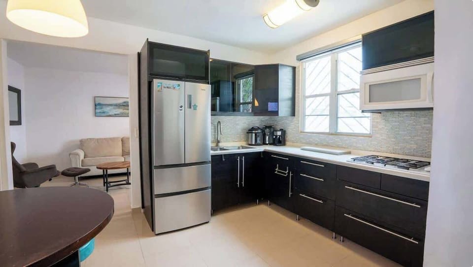 A functional kitchen ready for everything from coffee to home-cooked meals.