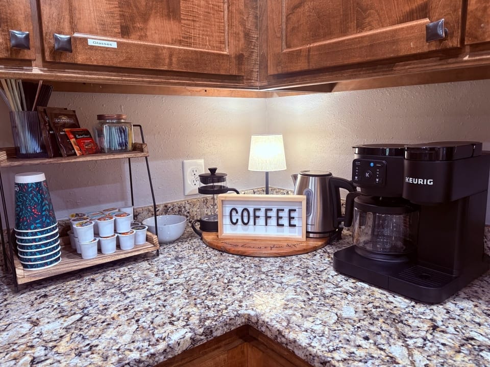 Coffee/Tea center with Keurig, drip and French Press. Sweeteners & creamer