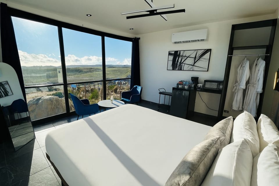 Deluxe Suite, Garden View | Iron/ironing board, free WiFi