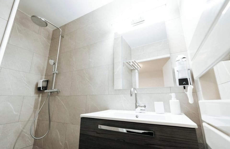 Hair dryer, towels, soap, shampoo