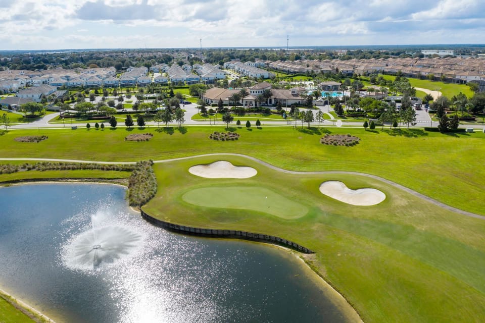 The house is located just an 11-minute drive from Champions Gate Golf Club.