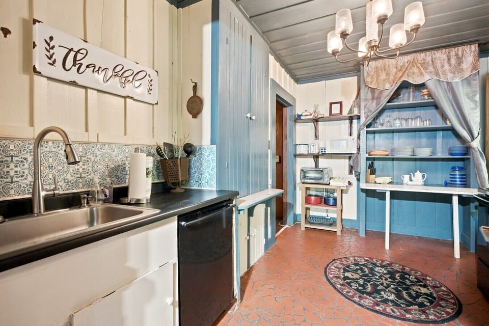 Main House Kitchen | Decorative Tile Backsplash | Open Shelving & Toaster Oven