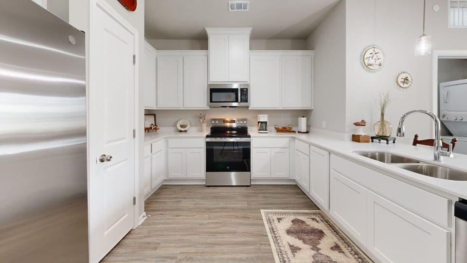 Modern kitchen with stainless steel appliances