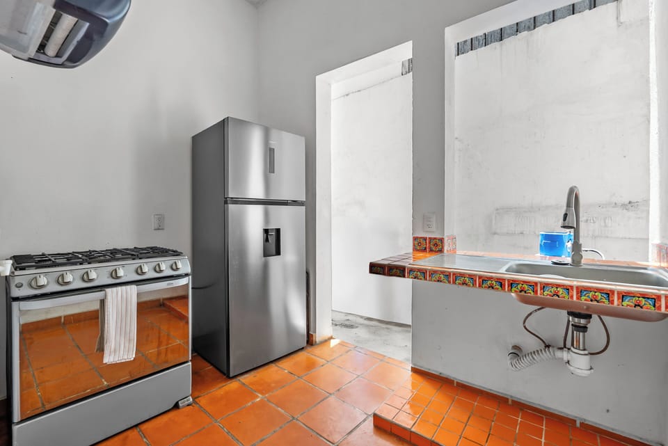 Presidential House, Balcony, City View | Private kitchen | Coffee/tea maker, electric kettle