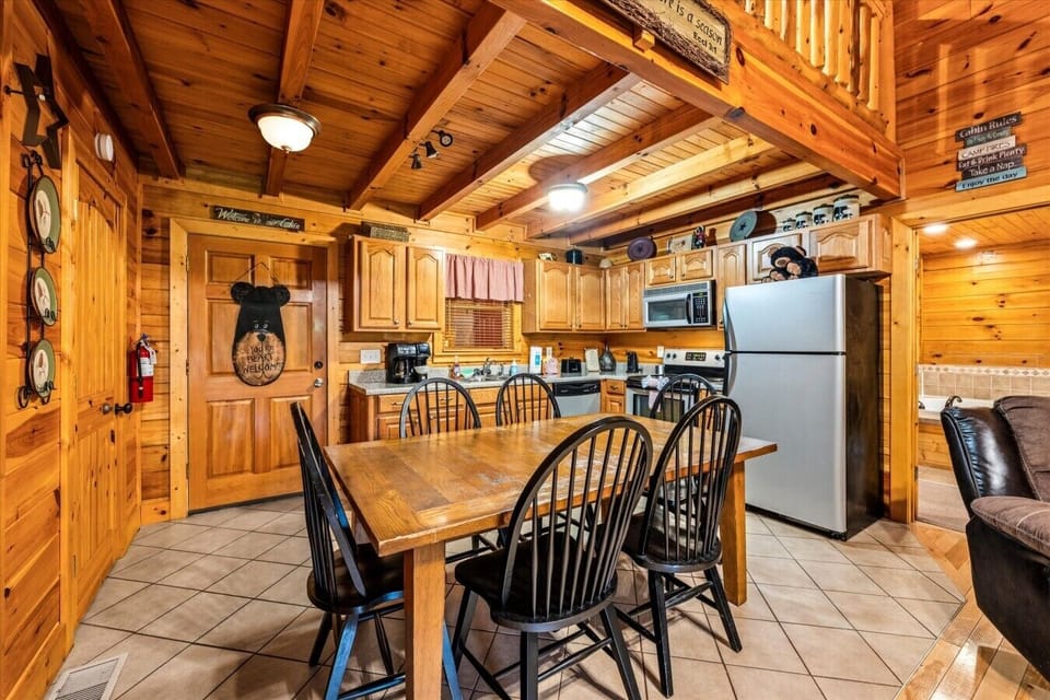 The kitchen and dining area make it easy to cook, gather, and enjoy time together, whether it is pancakes in the morning or dinner after a day out.