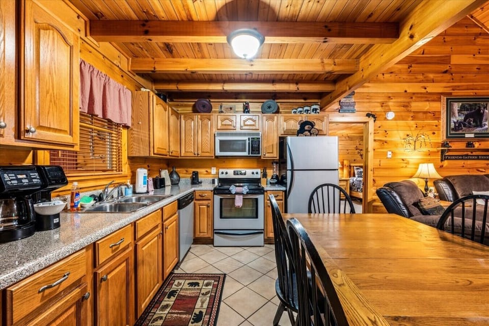 The welcoming kitchen has plenty of room for preparing family breakfasts, easy dinners, and snacks to fuel a full day in the Smokies.