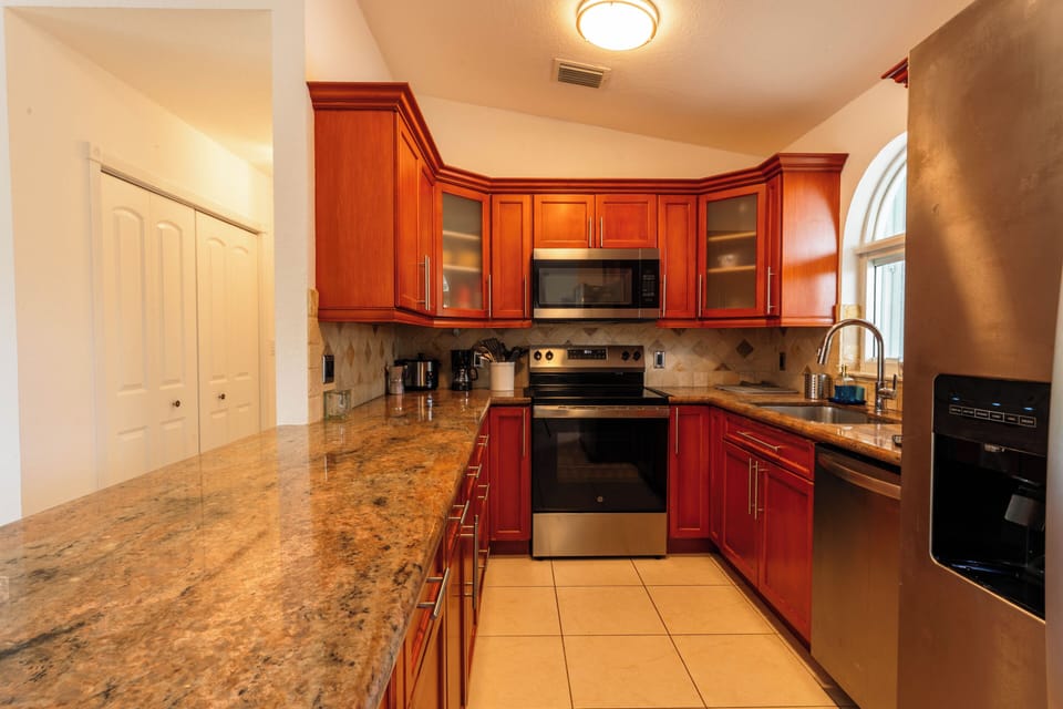 Fully equipped kitchen ready for simple meals during your stay