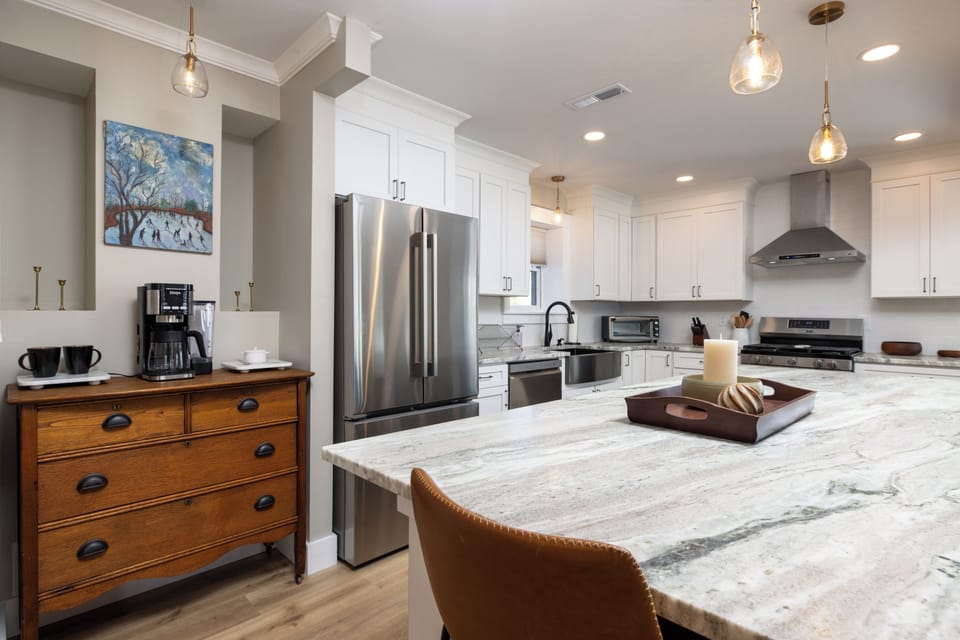 Kitchen with brand new appliances and cooking essentials 