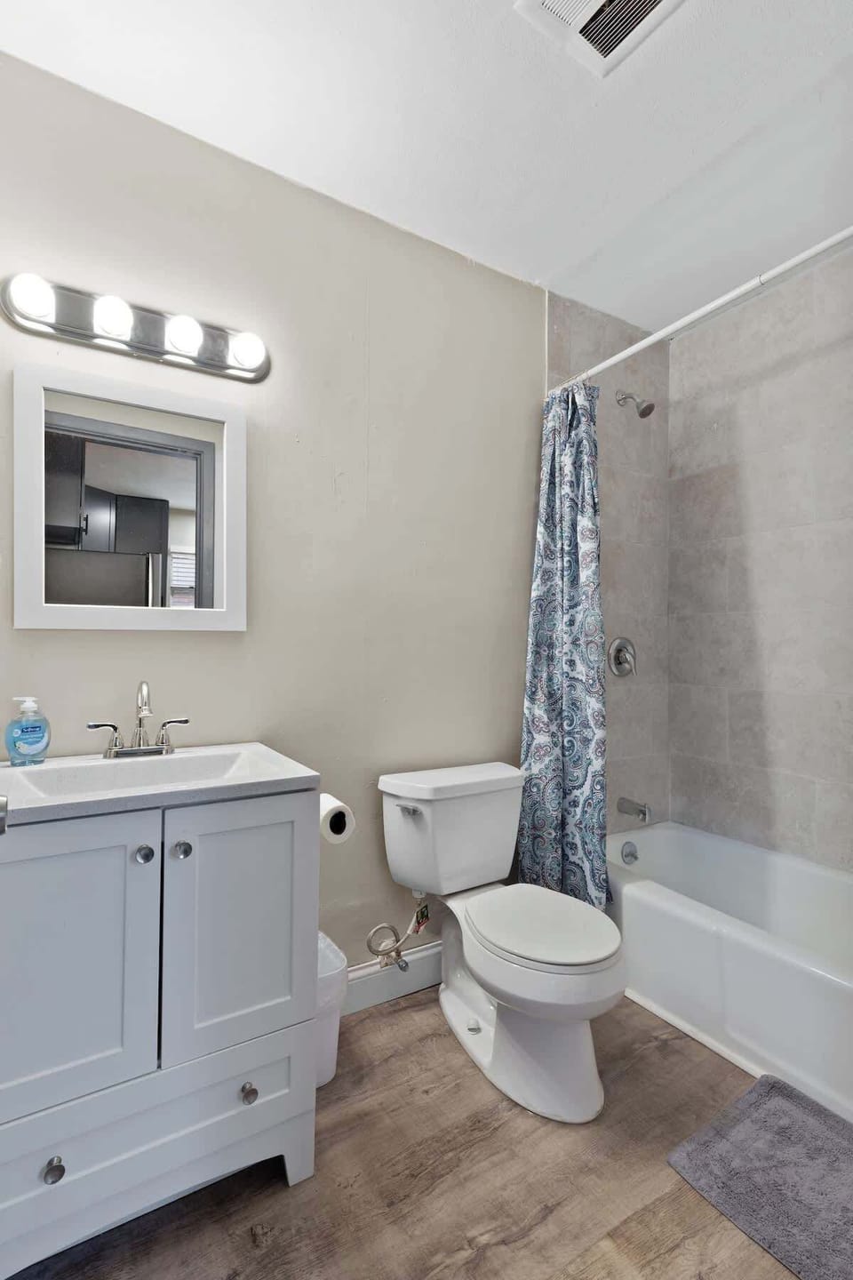 Bathroom — walk-in shower and vanity