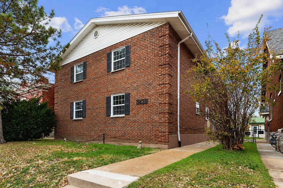 Brick exterior on Morganford Rd — free street parking + reservable rear spots; 3 mi to SSM SLU