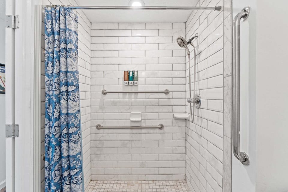 A convenient step‑in shower makes the space feel modern, fresh, and easy to use.