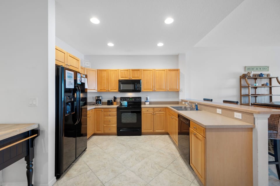 Large newly updated kitchen with stove, fridge & dishwasher
