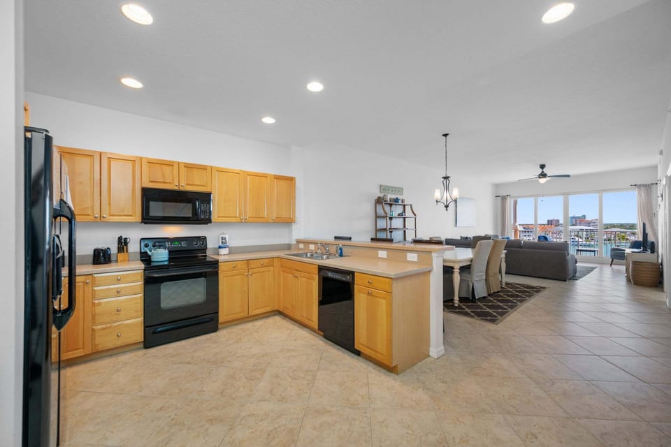 Large newly updated kitchen with breakfast bar and extra seating