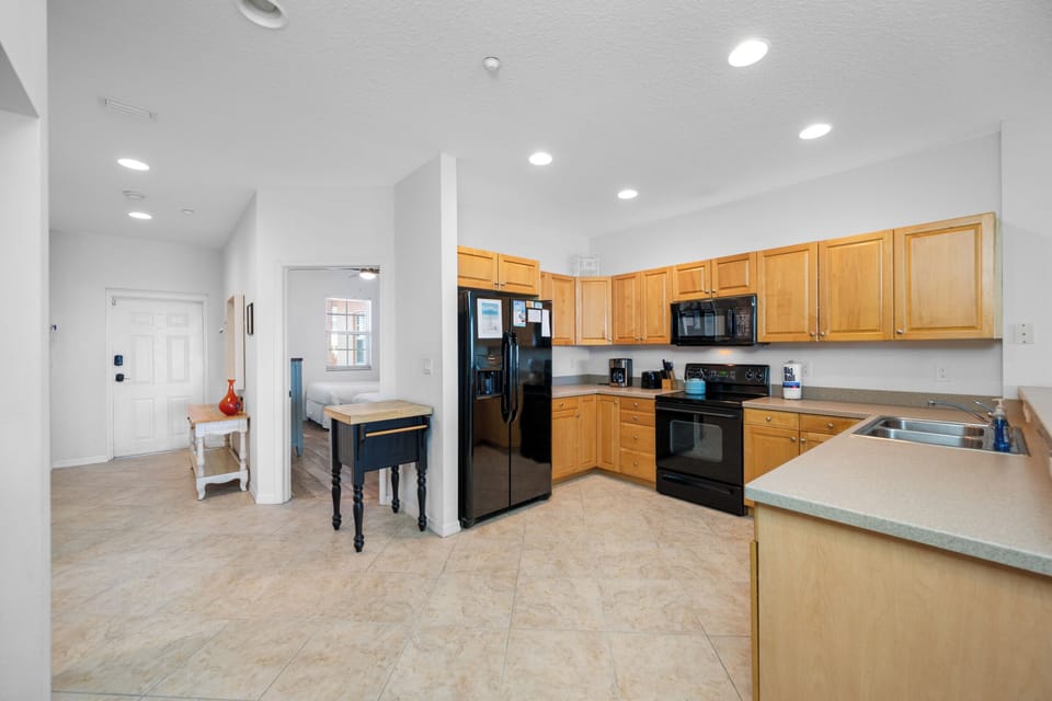 Large newly updated kitchen with stove, fridge & dishwasher