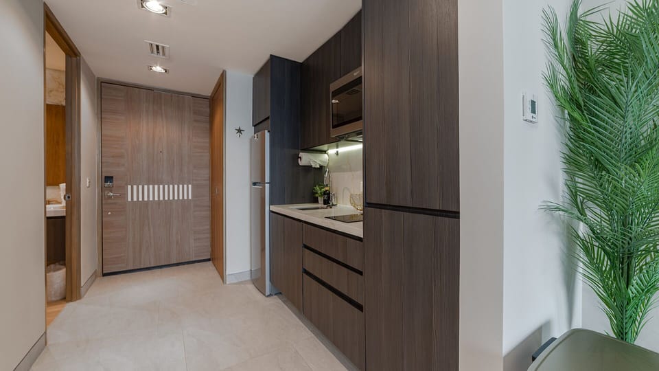 Two kitchenette, sink and full Fridge