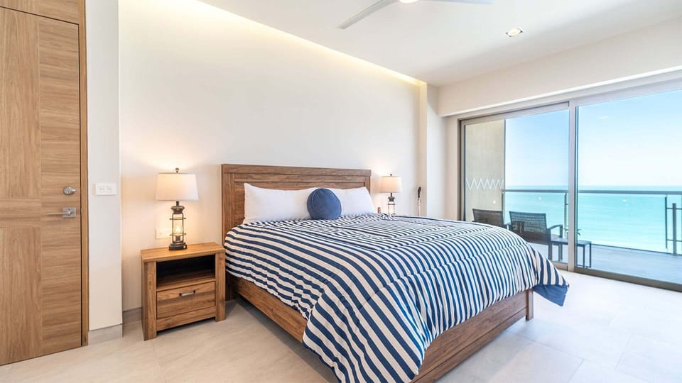 Comfortable king bed with fresh linens and elegant decor