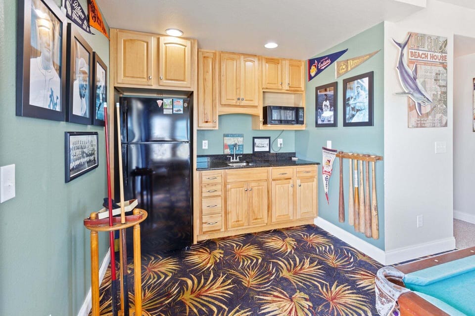 Let off some steam in the Game Room with a Pool Table and Wet Bar with Full Size Refrigerator!