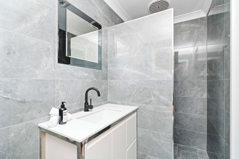 Bathroom 1 (Ensuite) - Shower + Hair Dryer 