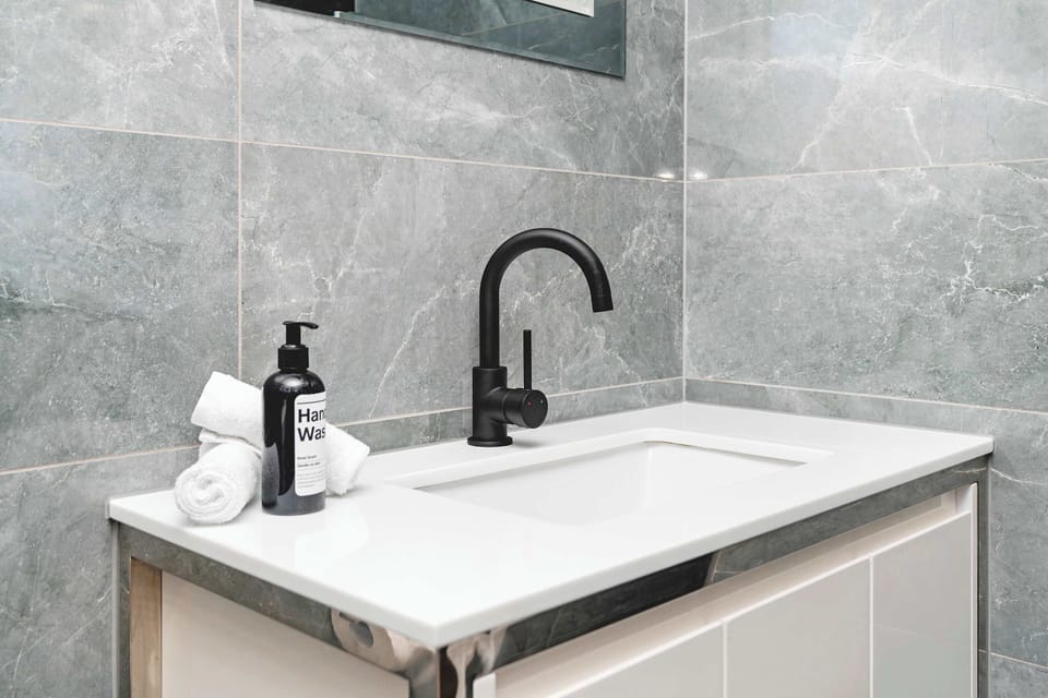 Bathroom 1 (Ensuite) - Shower + Hair Dryer 