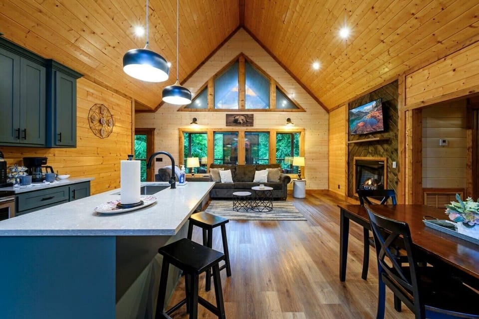 The sweeping interior layout gives groups a kitchen, dining, and living space that all flow together.