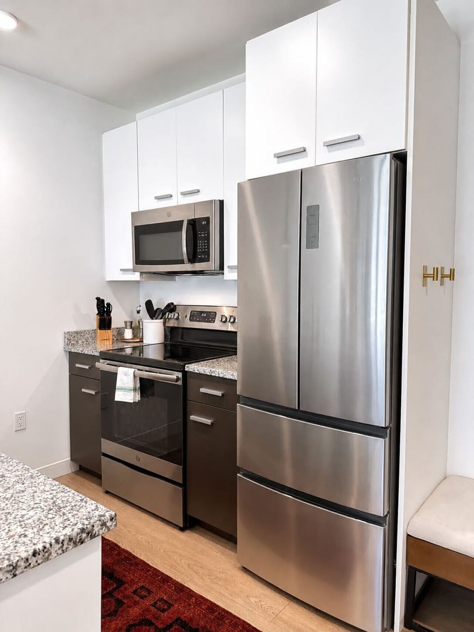 A fully-equipped kitchen with bar stool seating—everything you need to prep, cook, and refuel