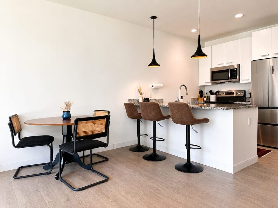 Multi-purpose dining space—perfect for enjoying a meal or spreading out your work