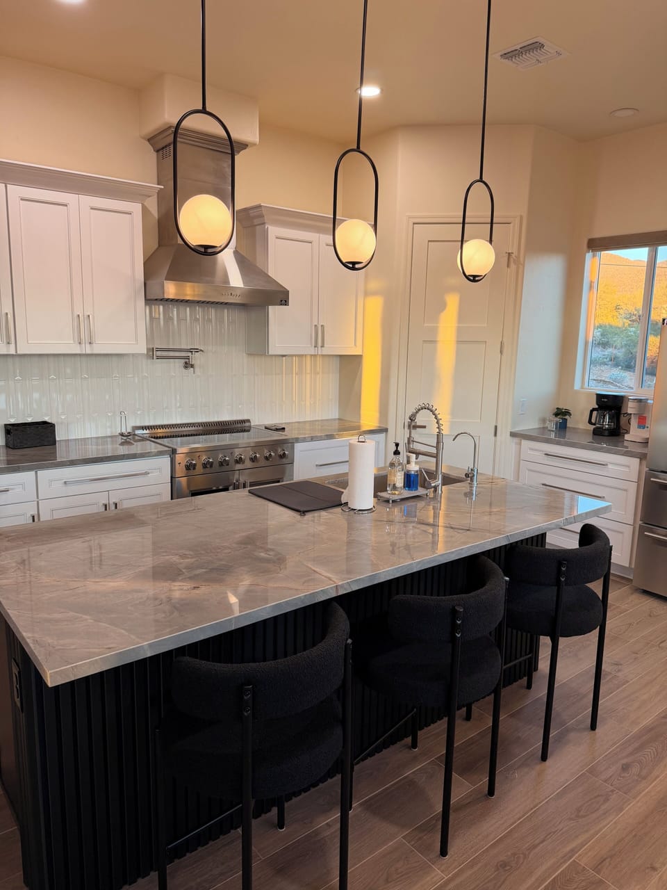 Full island with seating for 3 and ac power to work remotely. 