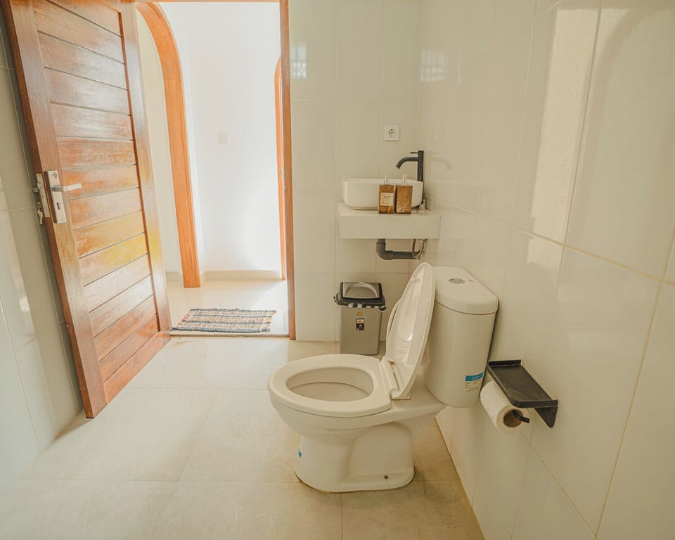 Deluxe Room, Patio | Bathroom | Free toiletries, bathrobes, soap, toilet paper