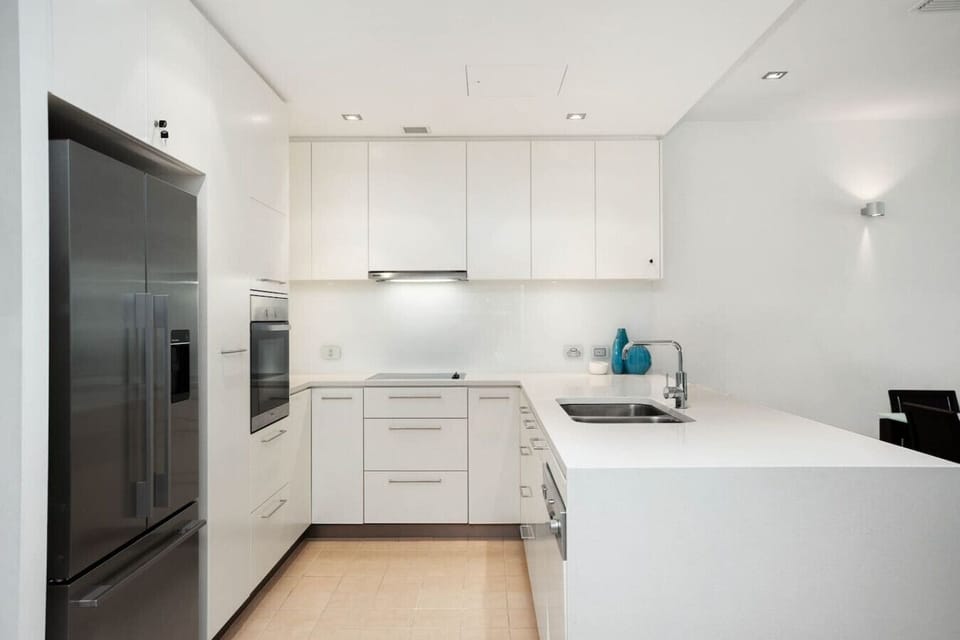 The kitchen makes cooking a pleasure, with generous bench space and modern appliances ready for everything from quick breakfasts to shared dinners.