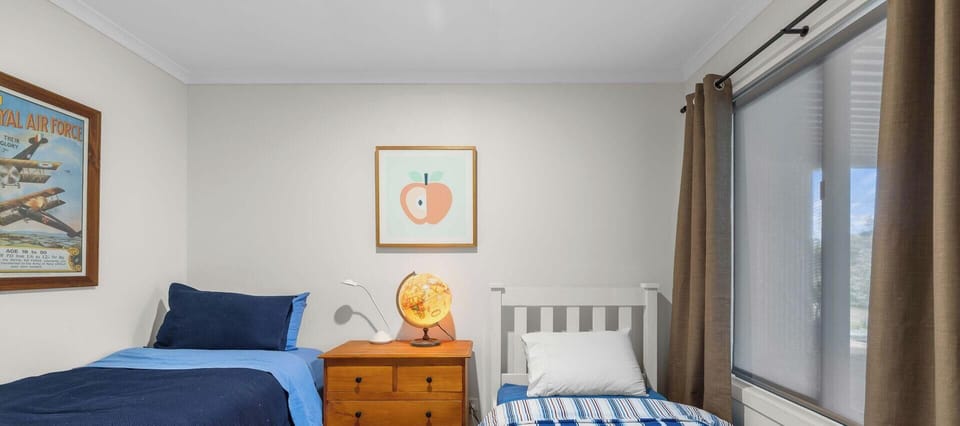 Bedroom Four with single beds downstairs