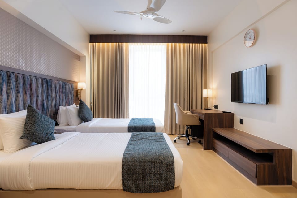 Superior Twin Room | Bathroom | Hair dryer, towels, soap, shampoo