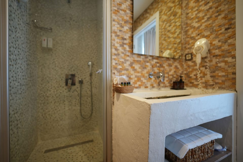 Comfort Room | Bathroom | Shower, hair dryer, slippers, towels
