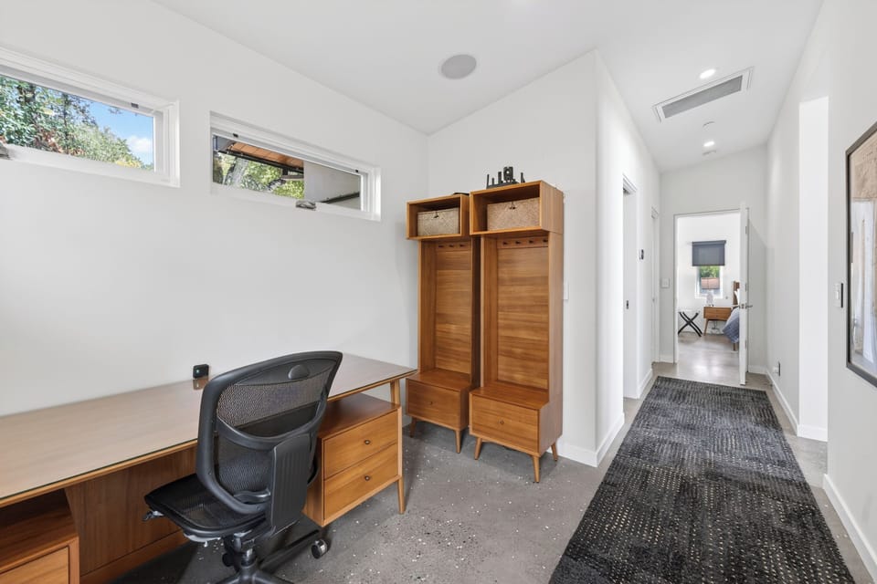 Dedicated home office space with built-in storage.