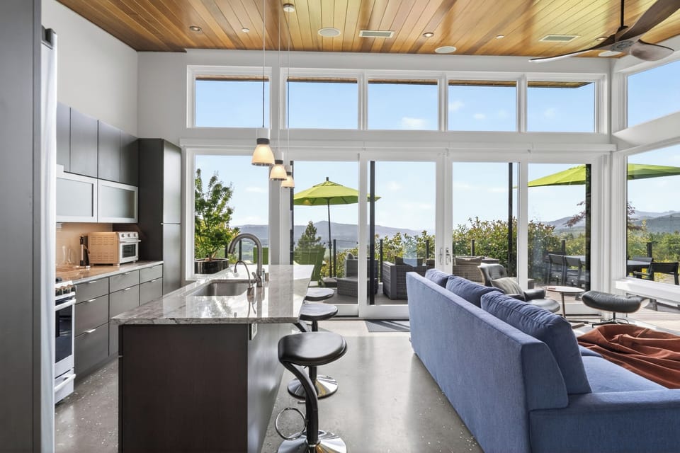 Integrated kitchen and living area designed for seamless entertaining.