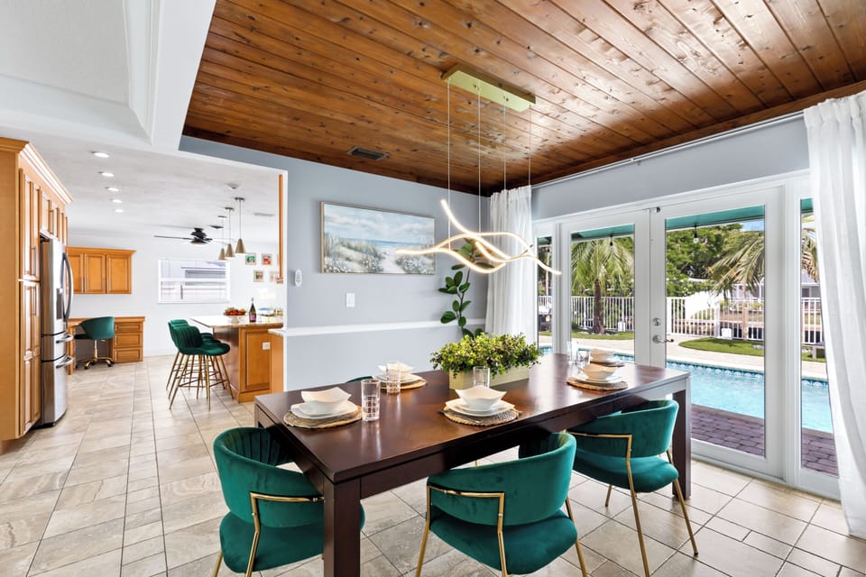 Dining room transition showing proximity to the kitchen.