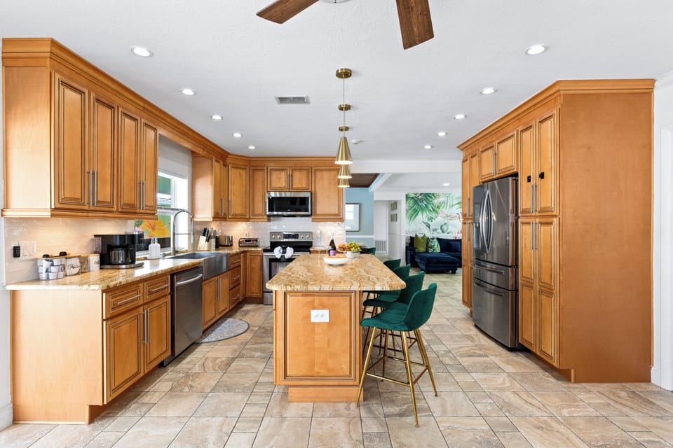 Fully equipped kitchen featuring stainless steel appliances.