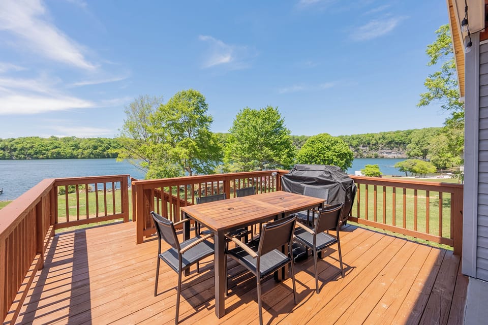 Outdoor dining area with beautiful lake views.